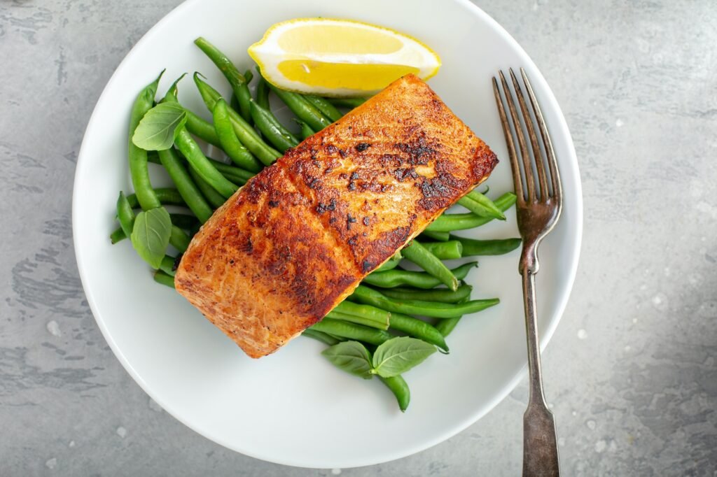 Grilled salmon served with green beans